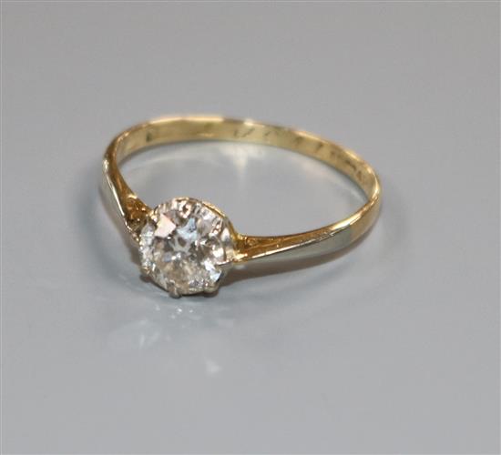An 18ct gold, platinum and solitaire diamond ring, size M.